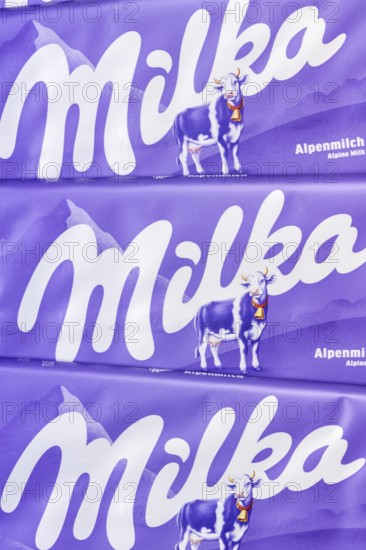 Milka chocolate 90g bar chocolate bar alpine milk chocolate background with logo in Stuttgart, Germany