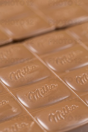Milka chocolate bar alpine milk chocolate background with logo in Stuttgart, Germany