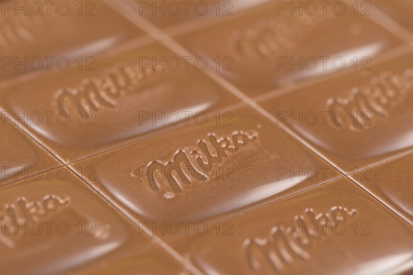 Milka chocolate bar alpine milk chocolate background with logo in Stuttgart, Germany