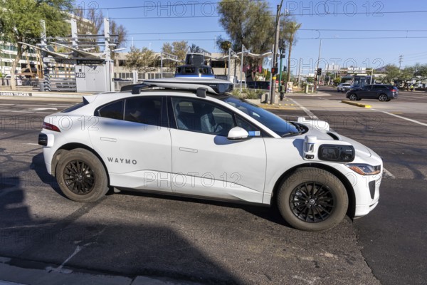 Waymo self-driving autonomous vehicle driverless car from Google and Jaguar Robotaxi in Phoenix, USA