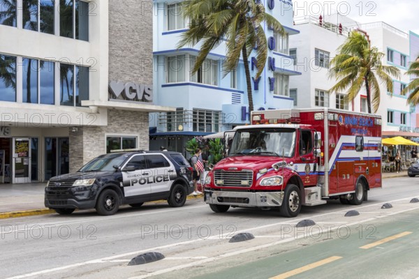 Fire and Police Car Fire Truck Police Car on Ocean Drive in Miami Beach, USA