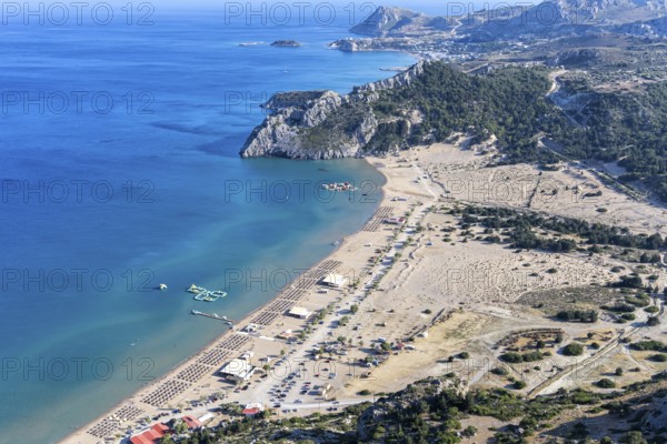 View of Tsambika beach from above Mediterranean seaside island of Rhodes, Greece