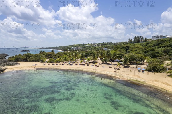 Mar Chiquita Beach in the Caribbean Ocean vacation Aerial view from above in Manati, Puerto Rico