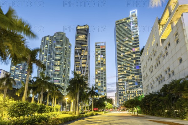 Miami skyline with high-rise real estate at night at Maurice A. Ferre Park in Miami, USA