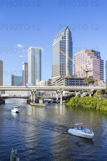 Tampa skyline with skyscrapers and bridge over Hillsborough River downtown in Tampa, USA