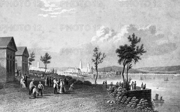 State capital Mainz, Rhineland-Palatinate, Germany, Rhine with waterfront, many walkers, waterfront fortification, trees, mountains, cityscape with Romanesque cathedral, architecture, steel engraving, historical illustration 1835