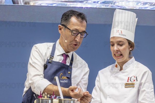 Cem is cooking! DEHOGA Baden-Württemberg event with candidate for the post of Minister-President, Cem Özdemir from the Green Party. He shows a trainee cook an injury that he has already sustained at home with a Japanese knife. Baden-Württemberg will elect a new state parliament on March 8, 2026. INTERGASTRA, leading trade fair for the hotel and catering industry. Stuttgart, Baden-Württemberg, Germany