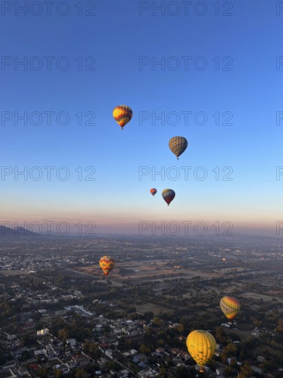 Panoramic aerial view of Mexico Teotihuacan pyramids. Hot air balloons flying over the Mexican Highlands near Mexico City