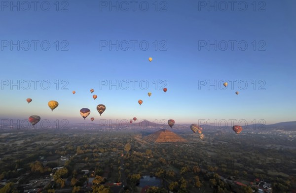 Panoramic aerial view of Mexico Teotihuacan pyramids. Hot air balloons flying over the Mexican Highlands near Mexico City