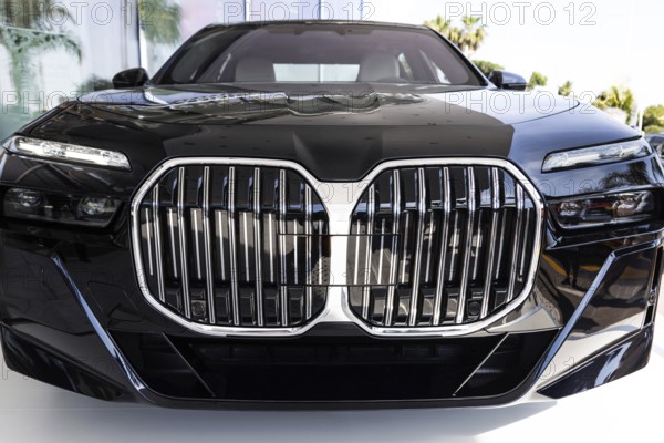 Front view of modern powerful luxury car design with modern build quality, exceptional performance and high technology integration features and fully autonomous driving capabilities