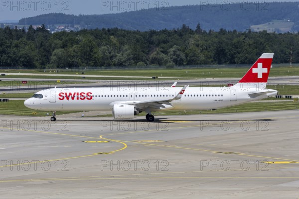 A Swiss Airbus A321neo aircraft with the HB-JPE license plate at Zurich Airport, Switzerland