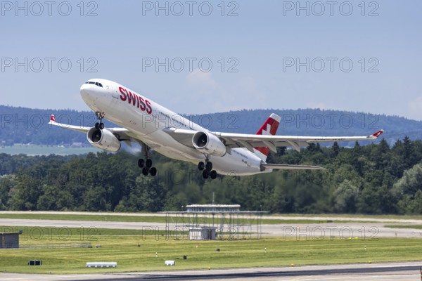 A Swiss Airbus A330-300 aircraft with the HB-JHB license plate at Zurich Airport, Switzerland