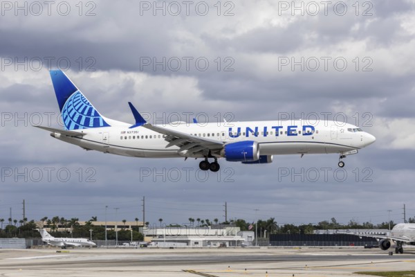 A United Airlines Boeing 737-8 MAX aircraft with license plate N37351 at Miami airport, USA