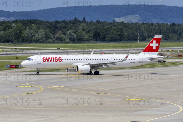 A Swiss Airbus A321neo aircraft with the HB-JPC license plate at Zurich Airport, Switzerland
