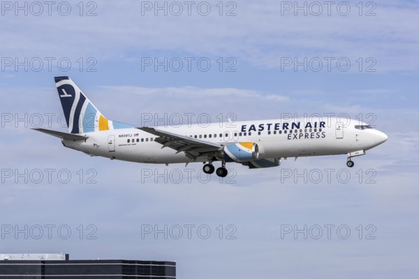 An Eastern Air Express Boeing 737-400 aircraft with license plate N808TJ at Miami airport, USA