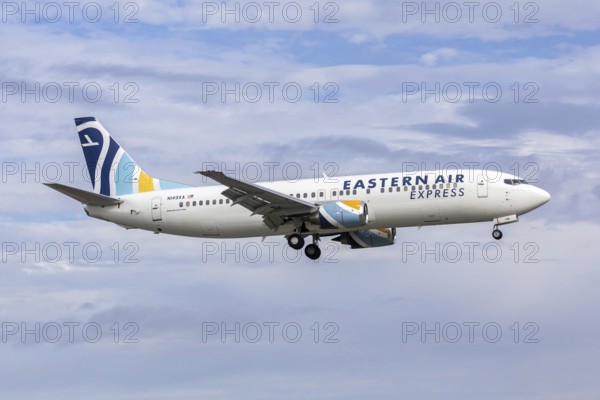 An Eastern Air Express Boeing 737-400 aircraft with license plate N149XA at Miami airport, USA