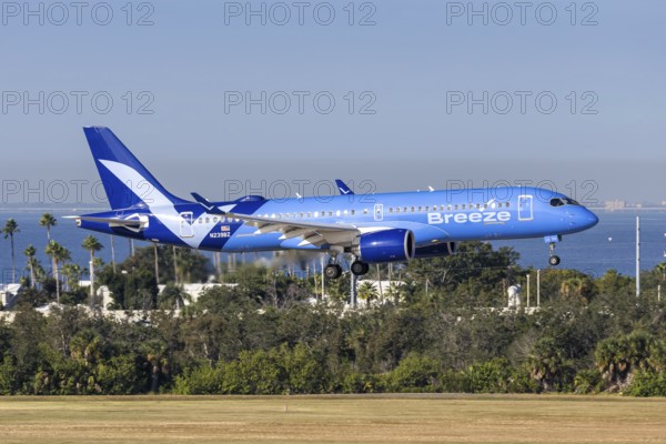 An Airbus A220-300 Breeze Airways aircraft with license plate N239BZ at Tampa airport, USA
