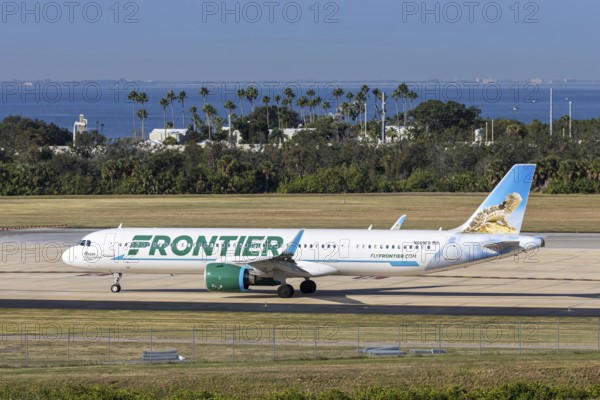 A Frontier Airlines Airbus A321neo aircraft with license plate N669FR at Tampa airport, USA