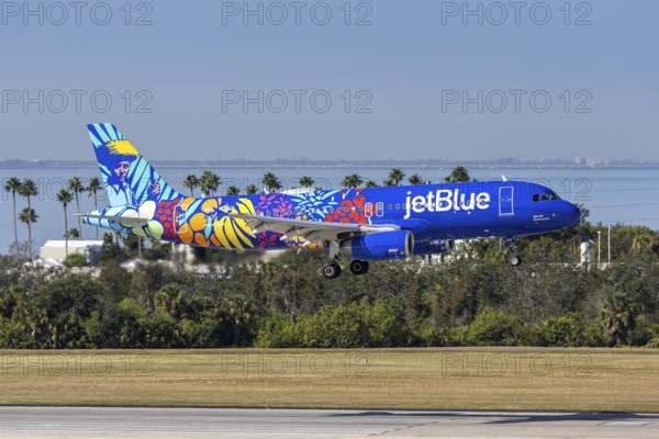 A JetBlue Airways Airbus A320 aircraft with the license plate N657JB and the Puerto Rico Isla del Bluencanto special livery at Tampa airport, USA