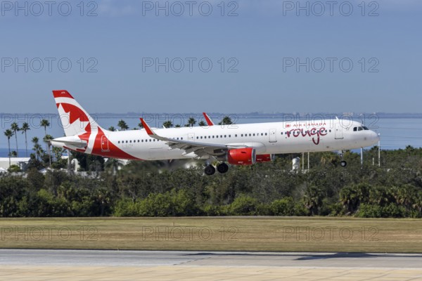 An Air Canada Rouge Airbus A321 aircraft with the license plate C-GJTH at Tampa airport, USA