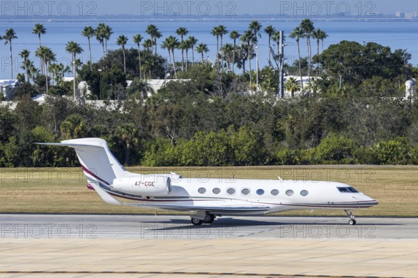 A Qatar Executive Gulfstream G650ER private jet aircraft with the license plate A7-CGE at Tampa airport, USA