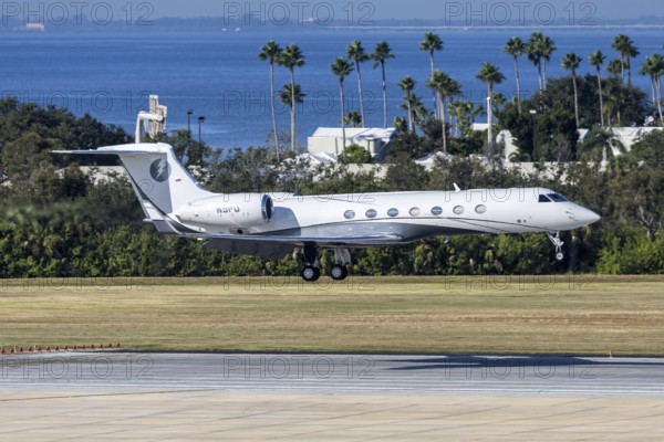 A Gulfstream G550 private jet aircraft with license plate N5PD at Tampa airport, USA