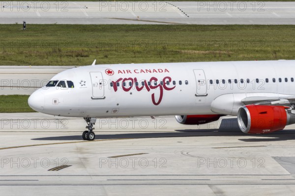 An Air Canada Rouge Airbus A321 aircraft with the license plate C-GHPJ at Fort Lauderdale airport, USA