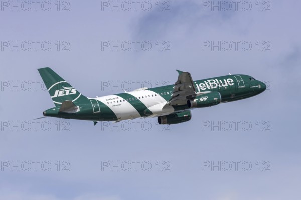 An Airbus A320 JetBlue Airways aircraft with license plate N746JB and the New York Jets NFL football special livery at Fort Lauderdale airport, USA