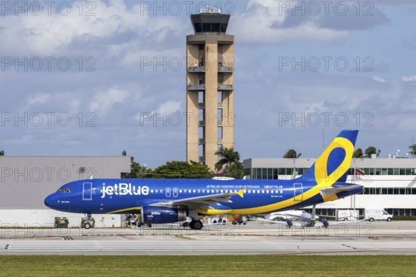 A JetBlue Airways Airbus A320 aircraft with license plate N775JB and JetBlue Honors our Veterans special livery at Fort Lauderdale airport, USA
