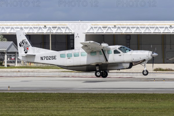 A Florida Air Cargo Cessna 208B Grand Caravan aircraft with license plate N702SE at Fort Lauderdale airport, USA