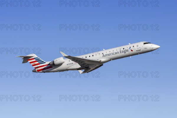 A Bombardier CRJ-700 from American Eagle operated by SkyWest Airlines with the license plate N705SK at Phoenix airport, USA