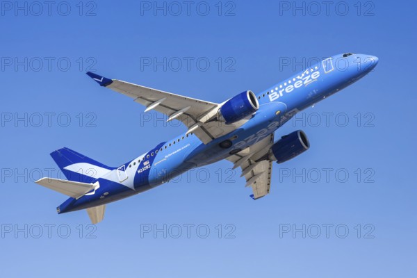 An Airbus A220-300 from Breeze Airways with license plate N230BZ at Phoenix airport, USA