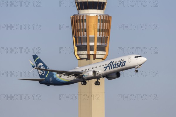 An Alaska Airlines Boeing 737-900ER aircraft with license plate N274AK at Phoenix airport, United States