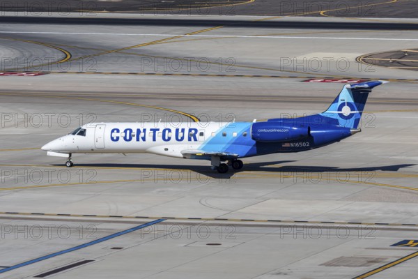 A Contour Airlines Embraer 135 aircraft with license plate N16502 at Phoenix airport, USA