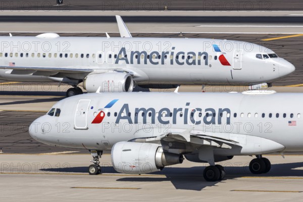 Airbus A319 and Boeing 737-800 American Airlines aircraft with license plate N776XF at Phoenix airport, United States