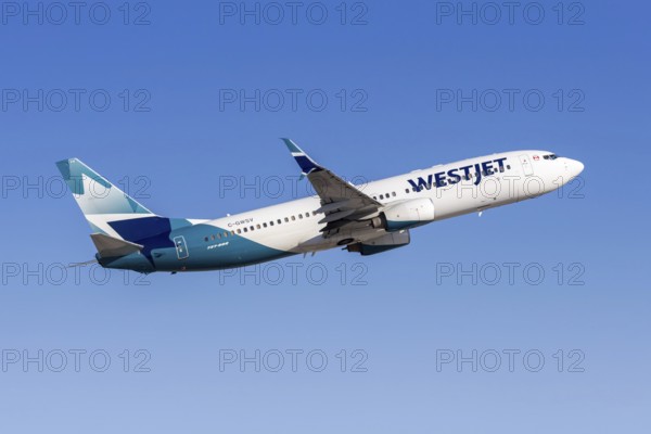 A Westjet Airlines Boeing 737-800 aircraft with the license plate C-GWSV at Phoenix airport, USA