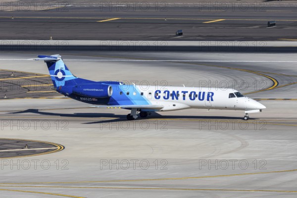 A Contour Airlines Embraer 135 aircraft with license plate N16525 at Phoenix airport, USA