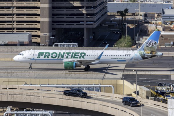 A Frontier Airlines Airbus A321 aircraft with license plate N708FR at Phoenix airport, USA