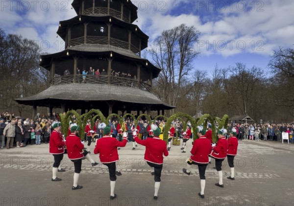 Schaeffler dance in 2026 in the English Garden, behind the Chinese Tower. The event takes place every 7 years between Epiphany and Shrove Tuesday, Munich, Bavaria, Germany