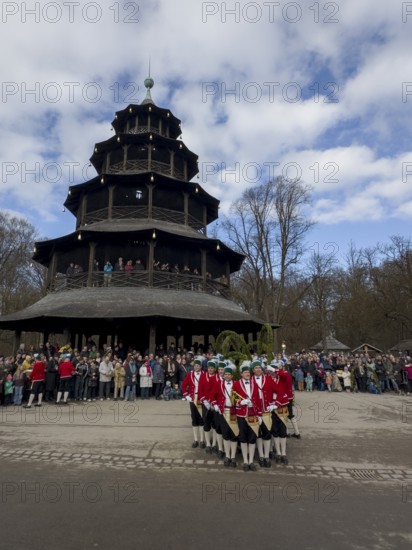 Schaeffler dance in 2026 in the English Garden, behind the Chinese Tower. The event takes place every 7 years between Epiphany and Shrove Tuesday, Munich, Bavaria, Germany