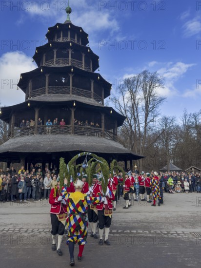 Schaeffler dance in 2026 in the English Garden, behind the Chinese Tower. The event takes place every 7 years between Epiphany and Shrove Tuesday, Munich, Bavaria, Germany