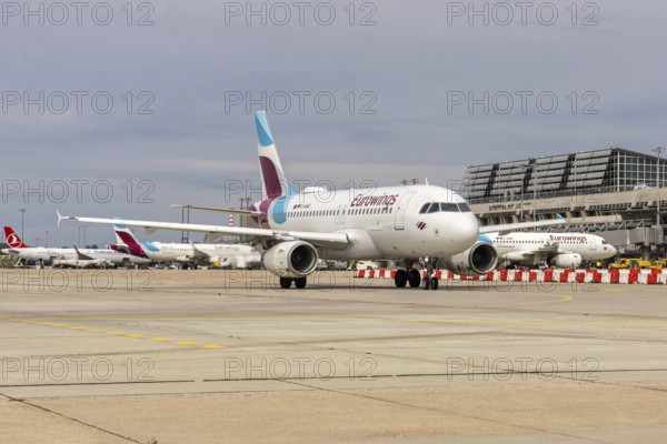A Eurowings Airbus A319 aircraft with the D-AGWG license plate at Stuttgart airport, Germany