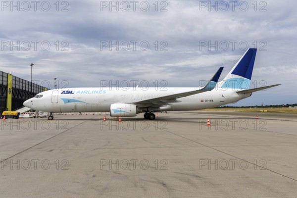 An ASL Airlines Boeing 737-800BCF aircraft with the license plate OE-IWB at the airport in Stuttgart, Germany
