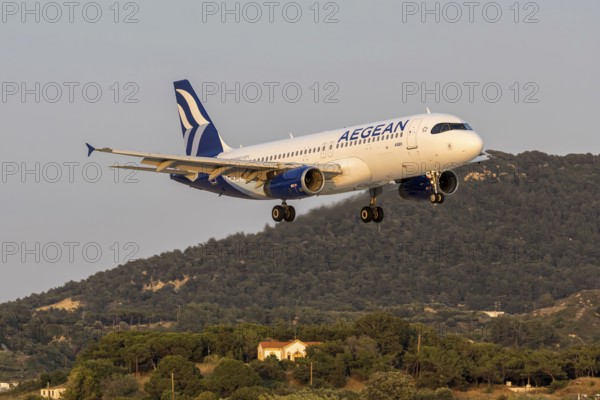An Aegean Airlines Airbus A320 aircraft with the license plate SX-DVW at Rhodes airport, Greece