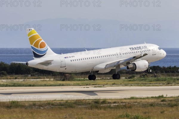 A Trade Air Airbus A320 aircraft with the license plate 9A-BTK at Rhodes airport, Greece