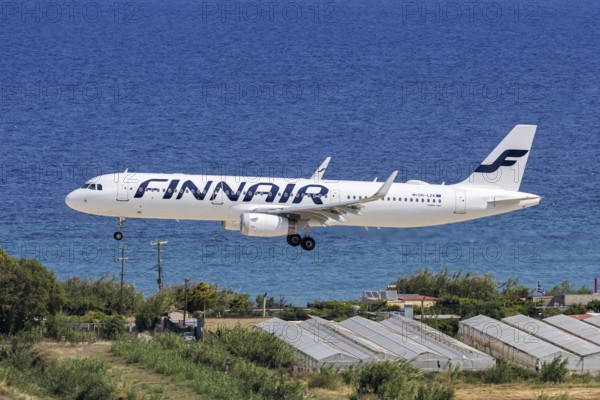 A Finnair Airbus A321 aircraft with the OH-LZK license plate at Rhodes airport, Greece