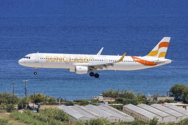 A Sunclass Airlines Airbus A321 aircraft with the license plate OY-TCI at Rhodes airport, Greece