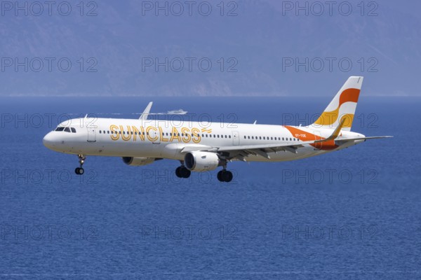 A Sunclass Airlines Airbus A321 aircraft with the license plate OY-TCE at Rhodes airport, Greece