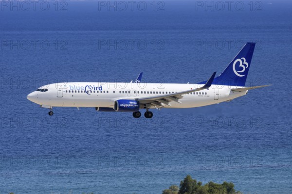 A Bluebird Airways Boeing 737-800 aircraft with the license plate 9H-KAR at Rhodes airport, Greece