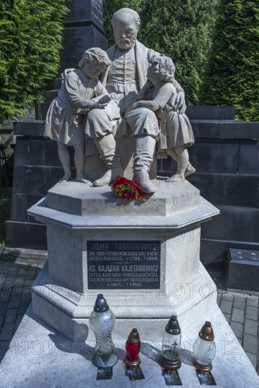 Sculptures on the grave of doctor Dr. Med. Josef Torosiewicz, 1784-1869 and the priest Kajetanowicz 1817-1900, Lützenhofer cemetery Lychakiwski cemetery, Lemberg, Galicia, Ukraine